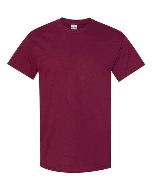Stacked Gildan 5000 blank t-shirts, the core style print shops hold as safety stock while ordering everything else just in time