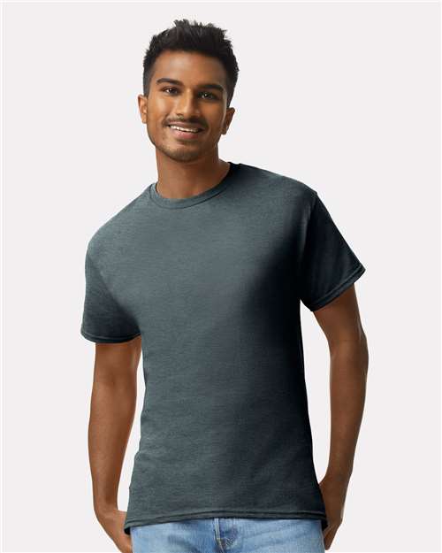 Gildan 2000 Ultra Cotton t-shirt in Dark Heather on a model, a core wholesale sportswear blank