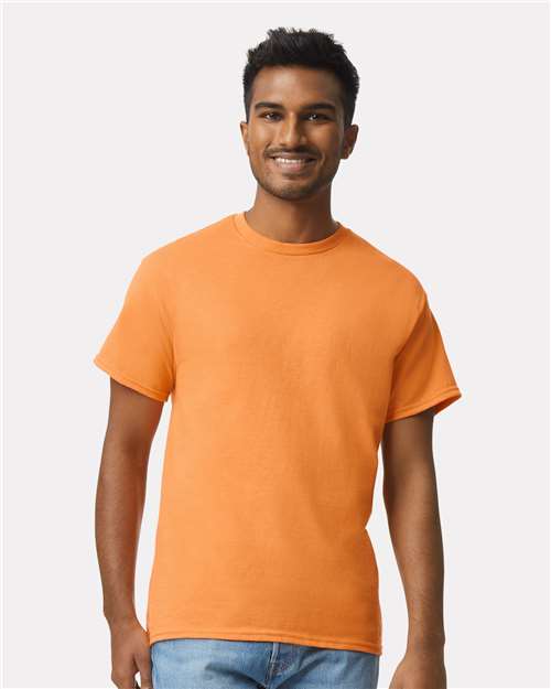 Gildan 2000 Ultra Cotton t-shirt on a model, a standard blank for bulk size-run orders