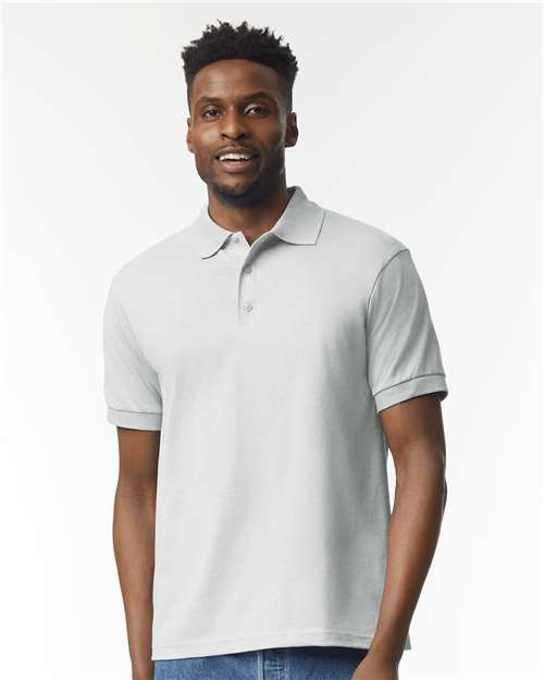 Gildan 8800 DryBlend jersey polo on a model — a wholesale staple for embroidered company uniforms