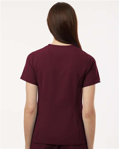 Women's Calix Fit & Flare Scrub V-Neck Top – On Model – Back