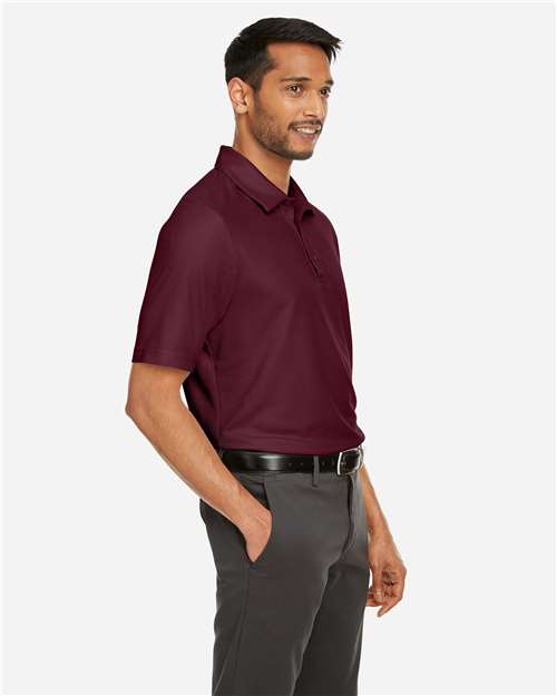 Men's Fusion ChromaSoft™ Pique Polo – On Model – Side
