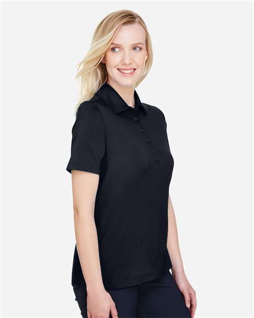 Women's CrownLux Performance® Range Flex Polo – On Model – Side