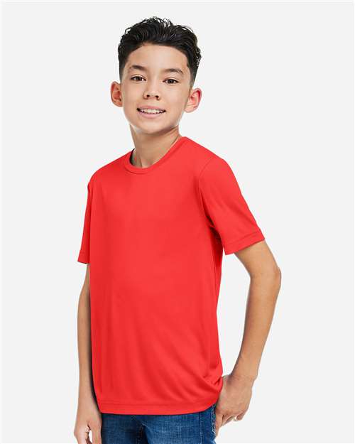 Youth Capital Performance T-Shirt – On Model – Side