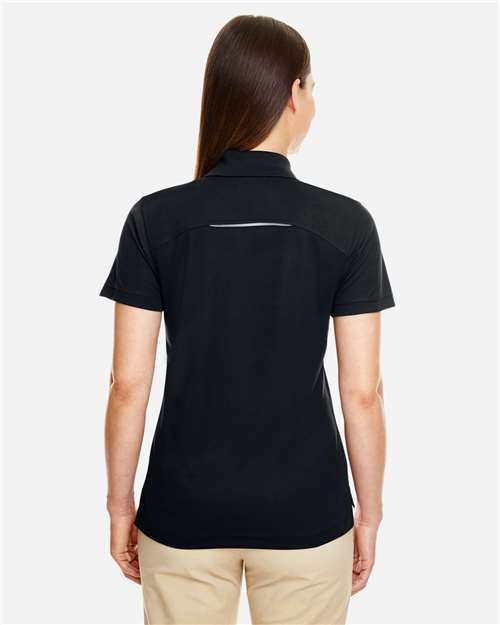 Women's Radiant Performance Piqué Polo with Reflective Piping – On Model – Back