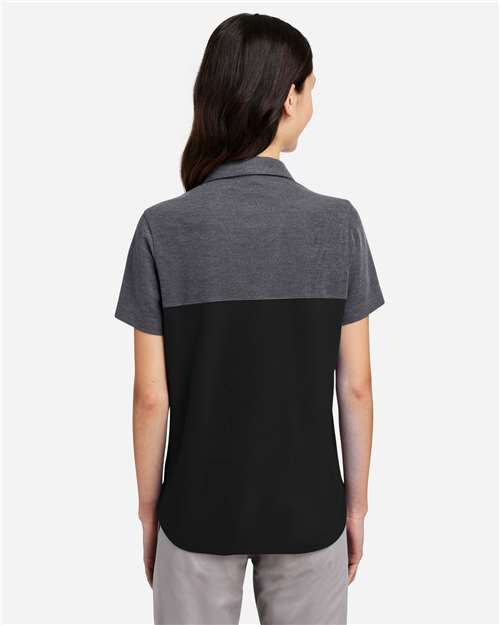 Women's Fusion ChromaSoft™ Colorblock Polo – On Model – Back