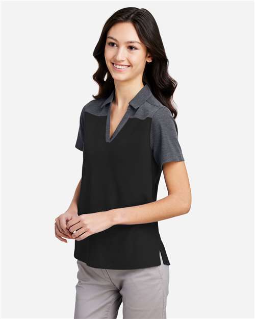 Women's Fusion ChromaSoft™ Colorblock Polo – On Model – Side