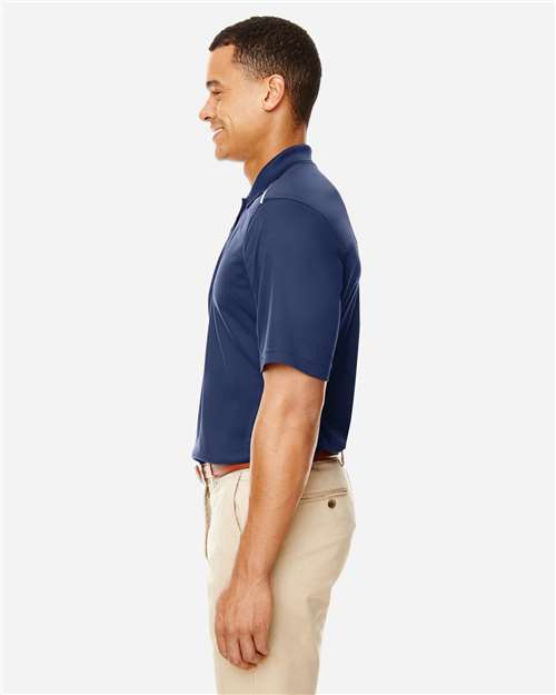 Men's Radiant Performance Piqué Polo with Reflective Piping – On Model – Side