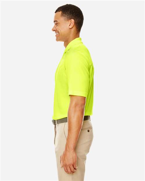 Men's Radiant Performance Piqué Polo with Reflective Piping – On Model – Side