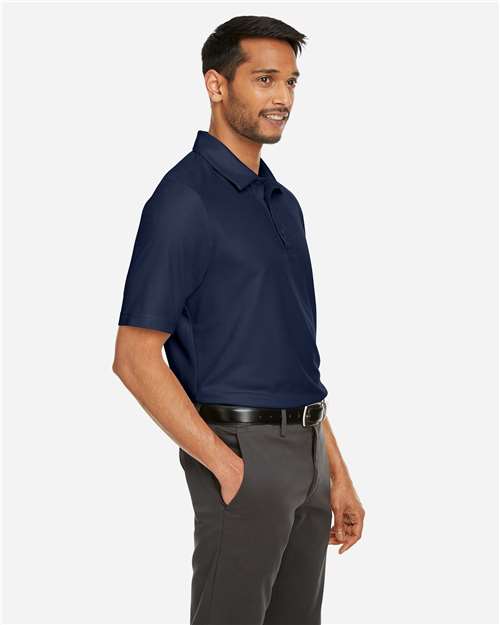 Men's Tall Fusion ChromaSoft™ Pique Polo – On Model – Side