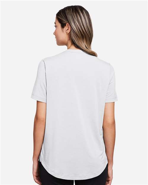 Women's JAQ Snap-Up Stretch Performance Polo – On Model – Back