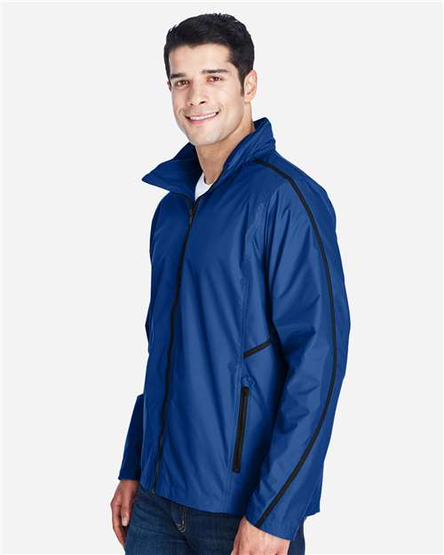 Unisex Conquest Jacket with Mesh Lining – On Model – Side