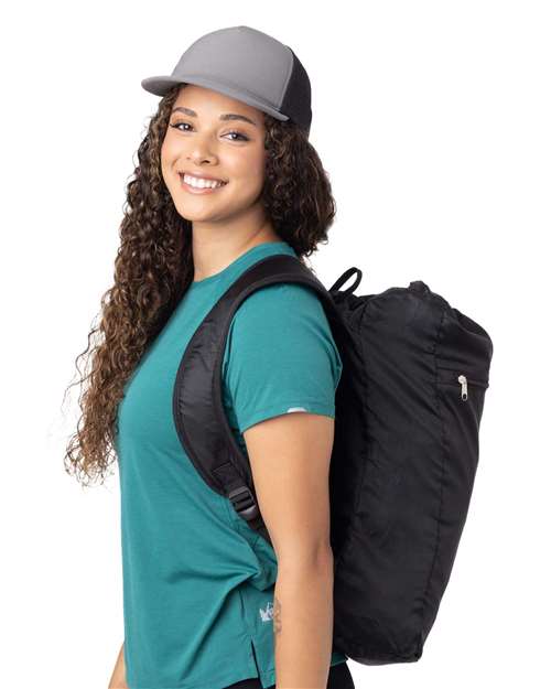 Getaway Cinchback Travel Backpack – On Model – Side