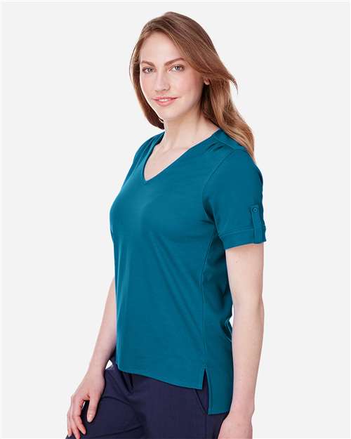 Women's CrownLux Performance® Plaited Rolled Sleeve Shirt – On Model – Side