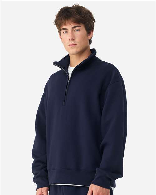Unisex 10 oz Quarter-Zip Pullover Sweatshirt – On Model – Side