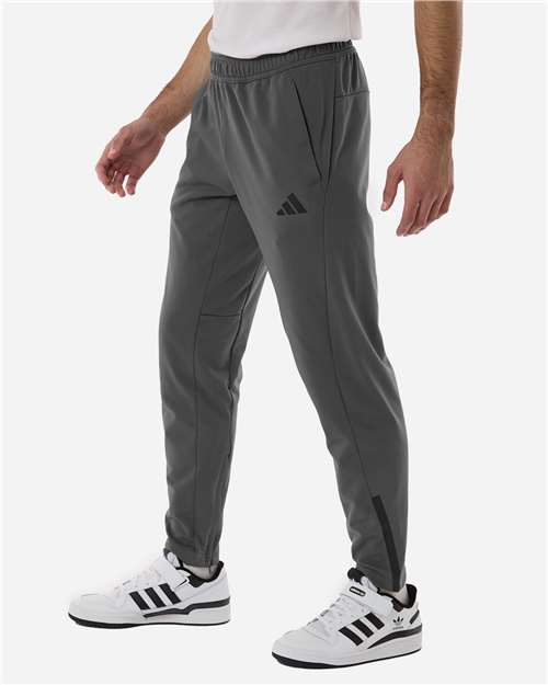 Men's Game & Go Fleece 3-Bar Sweatpants – On Model – Side