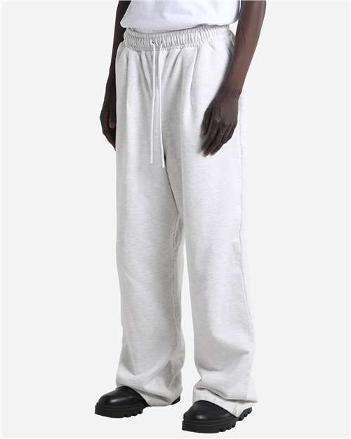Unisex Garment-Dyed Pleated Pants – On Model – Side