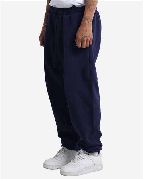 Unisex Max Heavy Garment-Dyed Sweatpants – On Model – Side