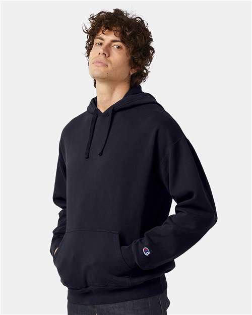 Unisex Garment-Dyed Hooded Sweatshirt – On Model – Side