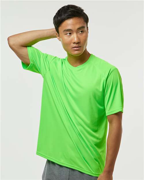 Unisex Islander Performance T-Shirt – On Model – Side